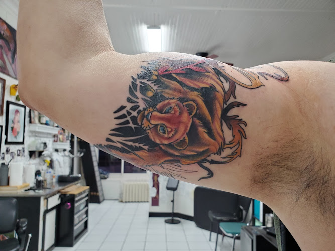 Work by Homeward Bound Tattoo