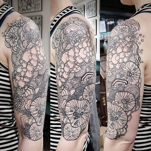 Work by Dark Harbor Tattoo
