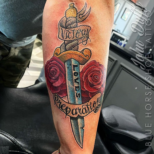 Work by World Famous Blue Horseshoe Tattoo and Piercing