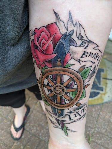 Work by Outlaw Custom Tattoo