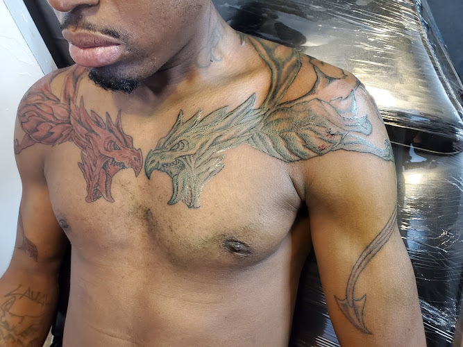 Work by Grind Design Tattoo
