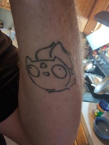 Work by Deathly Hallows Tattoo Co