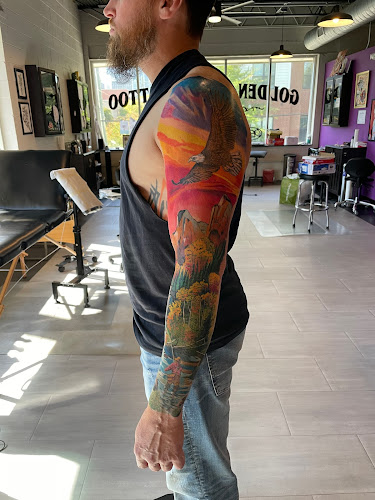 Work by Golden Coils Tattoo