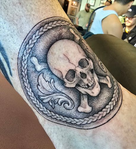 Work by Raleigh Tattoo Company