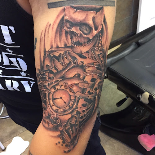 Work by Rock N Roll Tattoo & Piercing