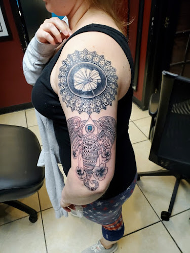Work by Romantic Torture Tattoo