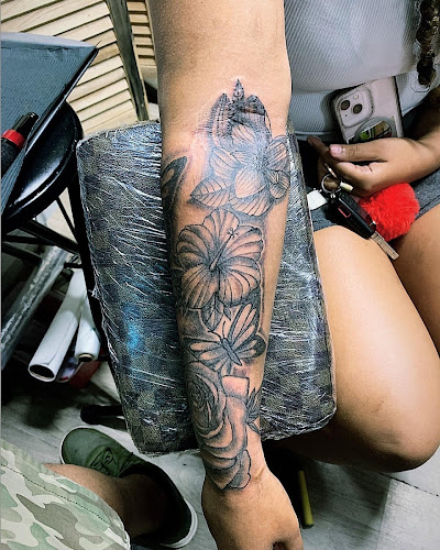 Work by Top Level Ink (Tattoos & Piercings)