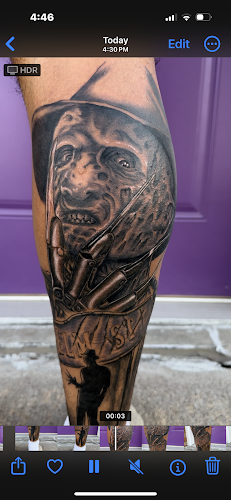 Work by Neon Dreams Tattoo