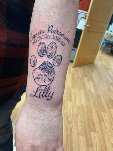 Work by Bad Cat Tattoo Studio