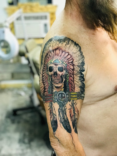 Work by Phuzion Storm Tattoo Shop