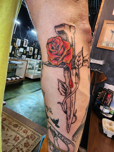 Work by Red River Tattoo Company LLC
