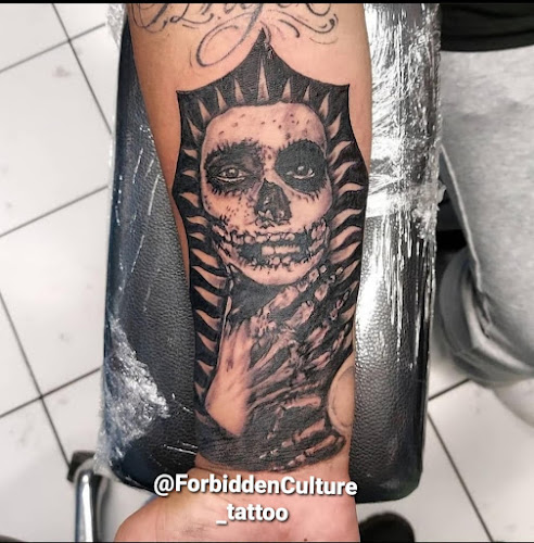 Work by Forbidden Culture Tattoo