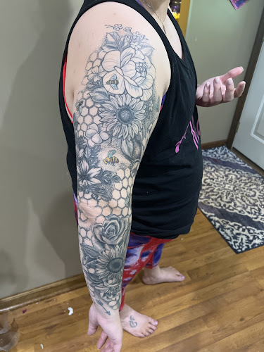 Work by Milestone Tattoo Studio