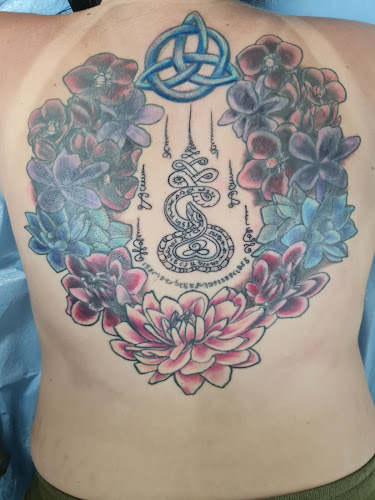Work by Wildwood Flower Tattoo