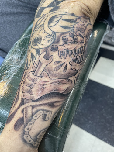 Work by Miller's Paradise Road Tattoo