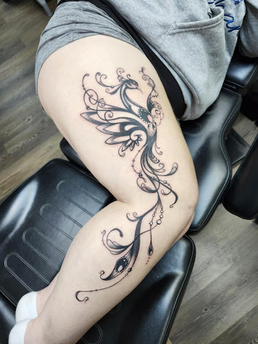 Work by The Black Lotus Tattoo & Art Collective