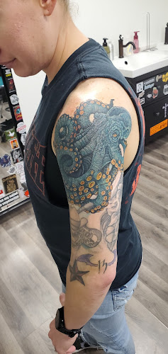 Work by Fossil Ink and Artistry