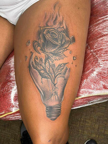 Work by Black Heart Tattoo and Body Piercing