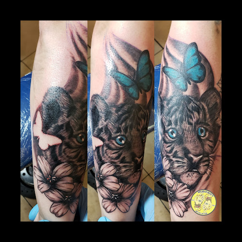Work by Rude Tattoo Gallery