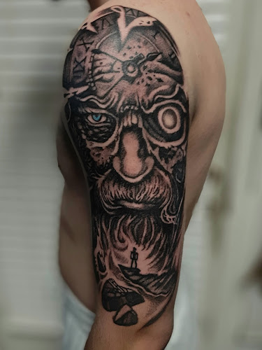 Work by TatMan Tattoos and Piercing