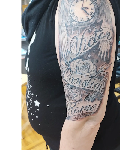 Work by Grave Light Tattoo and Art Studio