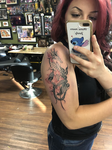 Work by Physical Graffiti Tattoo Studio