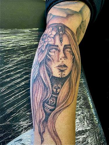 Work by Rebel Reds Salon & Tattoo