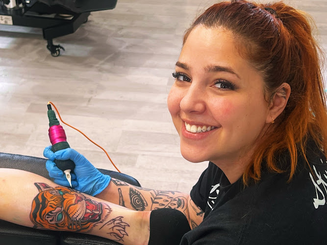 Work by Rockledge Tattoo Shop & Piercing Studio