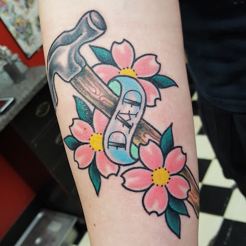 Work by Two Swallows Tattoo
