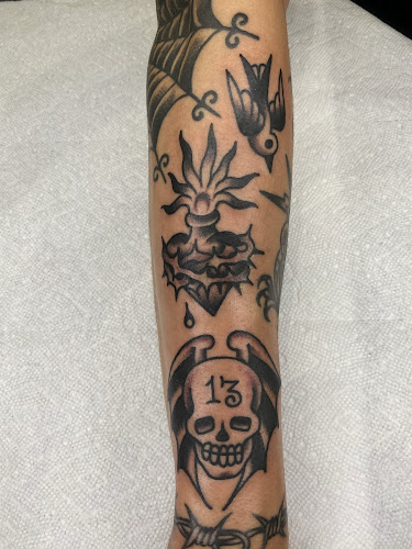 Work by 8 Ball Tattoo Parlor