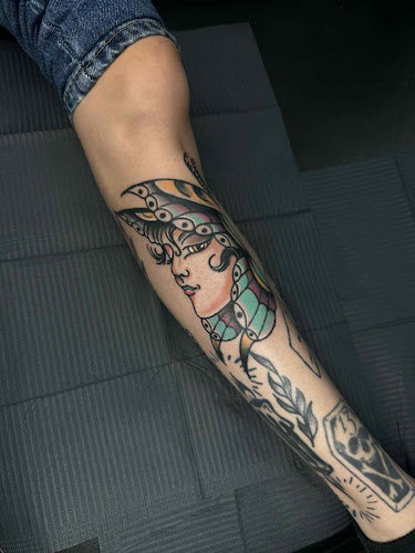 Work by Open Arms Tattoo Studio