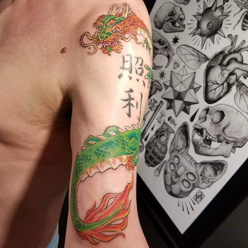 Work by Spotted Dog Tattoo