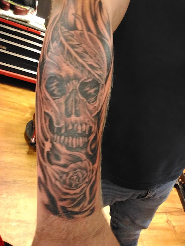 Work by Maddog Tattooz