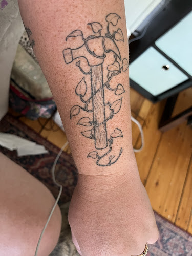 Work by Mycelium Tattoos