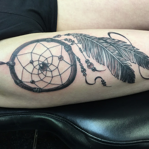 Work by Supercharged Tattoo
