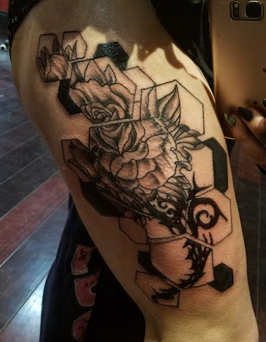 Work by Hidden Lotus Tattoo and Art Gallery
