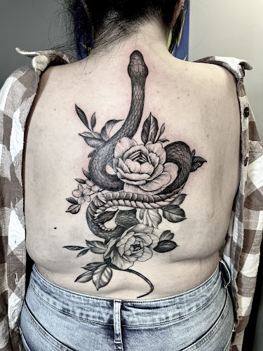 Work by Red Raven Tattoo SLC