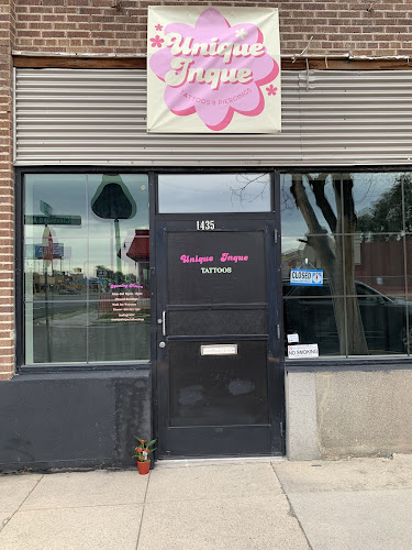 Work by Unique Inque Tattoo Shop
