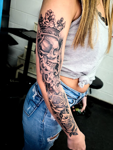 Work by Golden Anchor Tattoo