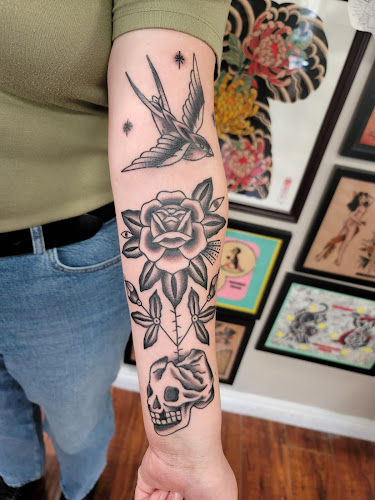 Work by Floating House Tattoo