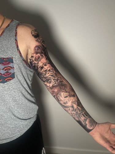Work by Black Hand Tattoo and Gallery