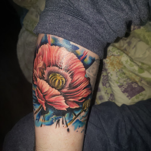 Work by Color Bomb Tattoo