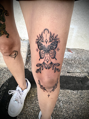 Work by Rivalry Tattoo and Piercing