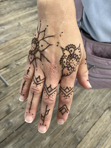 Work by Ocean Seven Body Piercing and Henna Tattoos