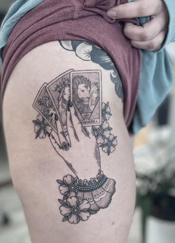 Work by Altar Sacred Tattooing