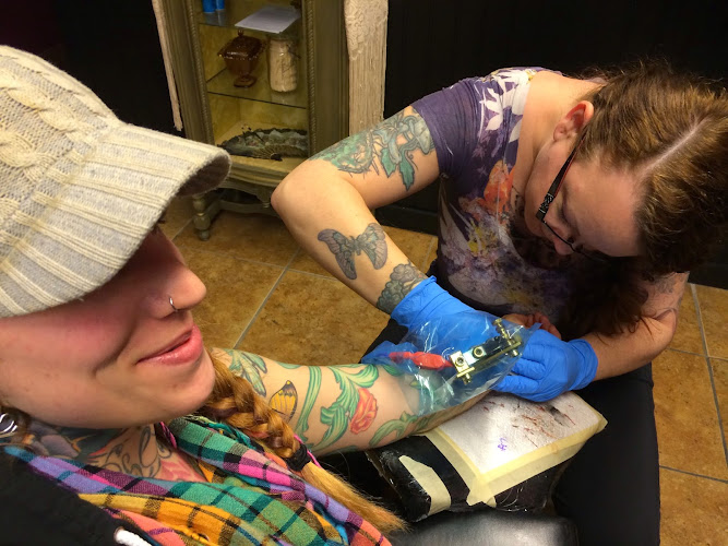 Work by American Beauty Tattoo