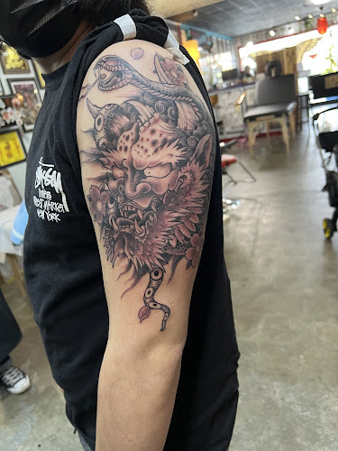 Work by Fist Full Of Metal Tattoo