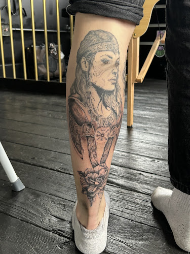 Work by Gold Scarab Tattoo