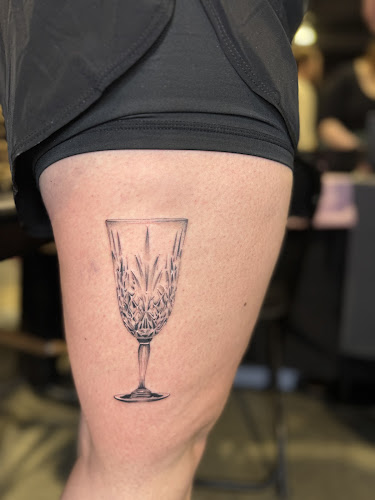 Work by Mama Bird Tattoo