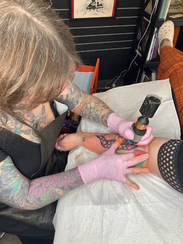 Work by White Lotus Tattoo